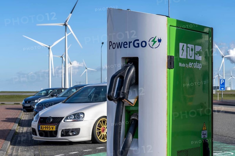 Electric car fast charging station, from the Dutch provider PowerGo, in the ferry harbour of Eemshaven, powered by renewable energy, Netherlands