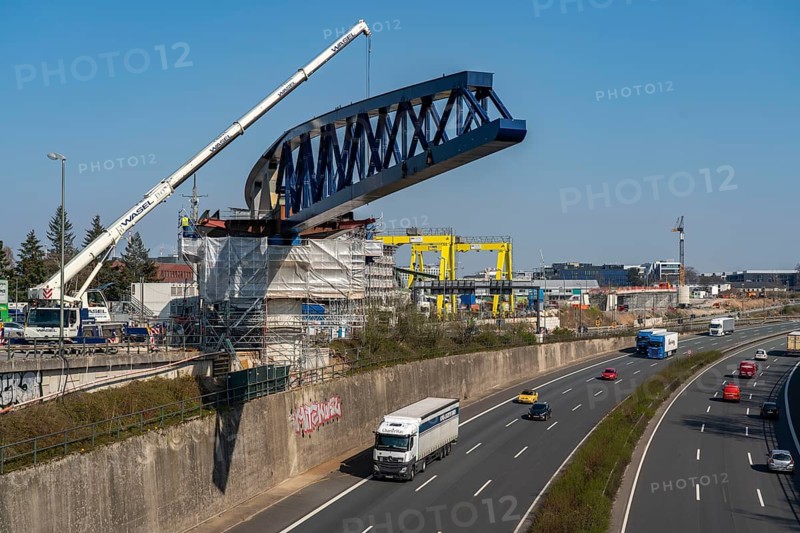 Construction of a 480 metre long bridge for the new light rail line U81, over the Nordsternkreuz, over the A44 and the B8 at Düsseldorf Airport, the bridge sections are moved on 5 piers using the incremental launching method after assembly, North Rhine-Westphalia, Germany, Europe