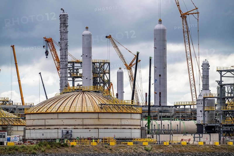 New building, construction site, of a bio-refinery of the Finnish oil company Neste, here, among other things, sustainable bio aviation fuels are to be produced, construction site in the harbour Maasvlakte 2, in Rotterdam, Netherlands