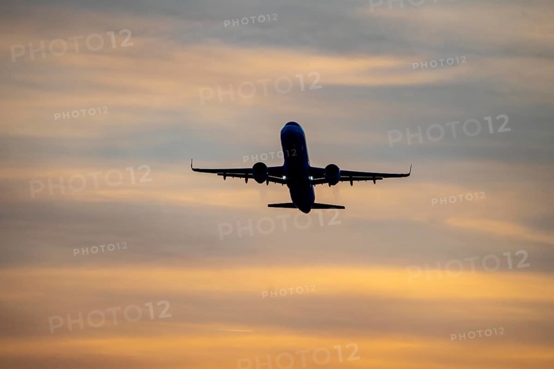 Düsseldorf International Airport, sunset, aircraft taking off from the main runway south, 05R/23L, North Rhine-Westphalia, Germany, Europe