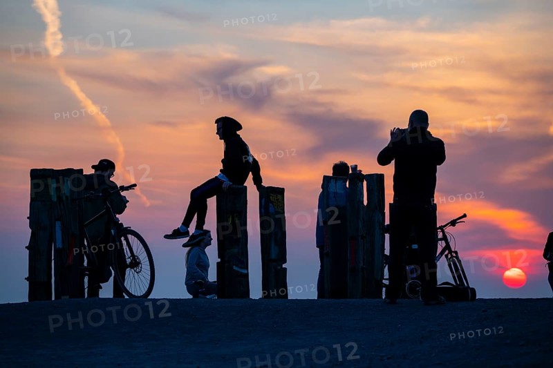 The Haniel spoil tip, 185 metre high spoil tip, at the Prosper Haniel mine, which was closed in 2019, artwork Totems by the sculptor Augustin Ibarrola, sunset, Bottrop, Germany, Europe