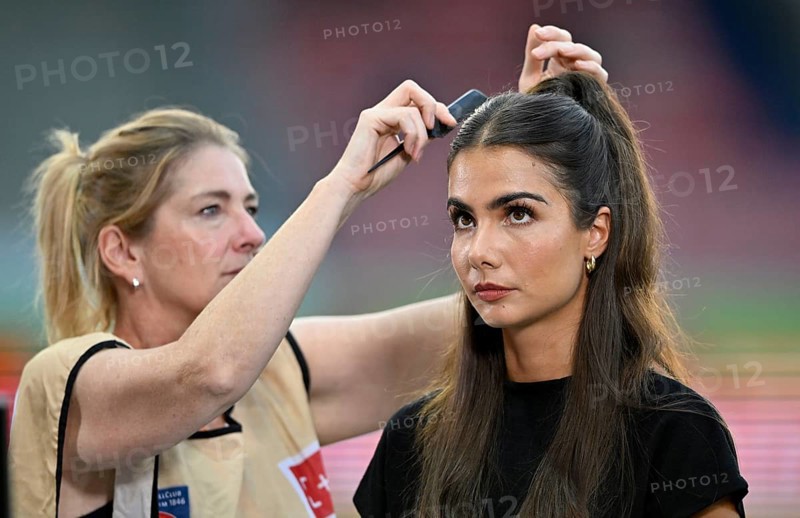 Make-up artist fixes the hair of TV presenter Lea Wagner, portrait, Voith Arena, Heidenheim, Baden-Württemberg, Germany, Europe