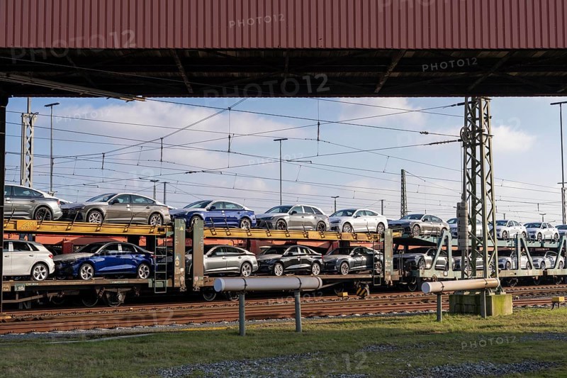 Car train, goods train on its way to the car terminal in Bremerhaven seaport, new German cars for export overseas, Bremerhaven, Bremen, Germany, Europe