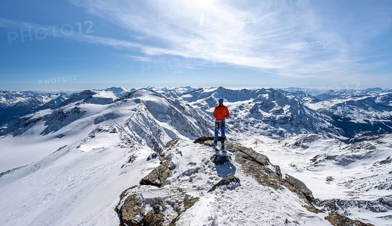Ski tourer at the summit of Monte Cevedale, looking into the distance, mountain panorama, snow-covered mountain landscape in winter, Ortler Alps, Vinschgau Valley, Italy, Europe