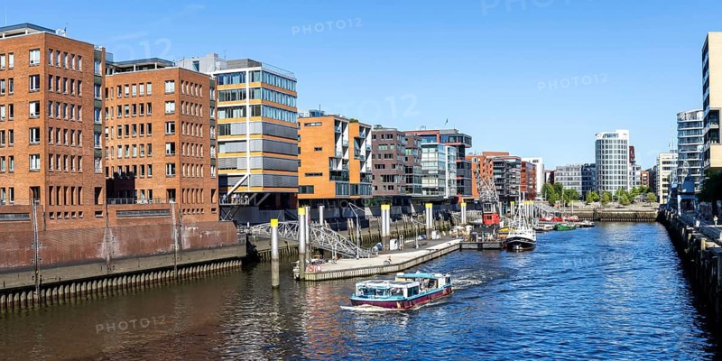 Building in the HafenCity Sandtorhafen harbour with boats panorama in Hamburg, Germany, Europe