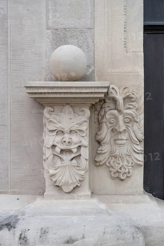 Two grotesques on the crown stone of the entrance portal of the Knaufmuseum, Iphofen, Lower Franconia, Bavaria, Germany, Europe