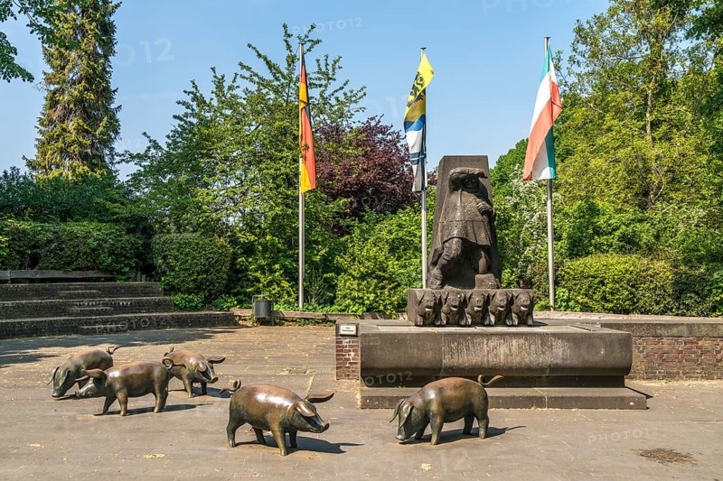 The pig fountain in the town of Zons, Dormagen, Lower Rhine, North Rhine-Westphalia, Germany, Europe