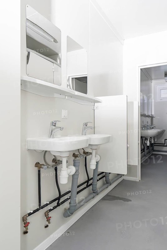 Bright bathroom with two washbasins and minimalist mirrors, refugee accommodation Beermiß, Calmbach, Black Forest, Germany, Europe