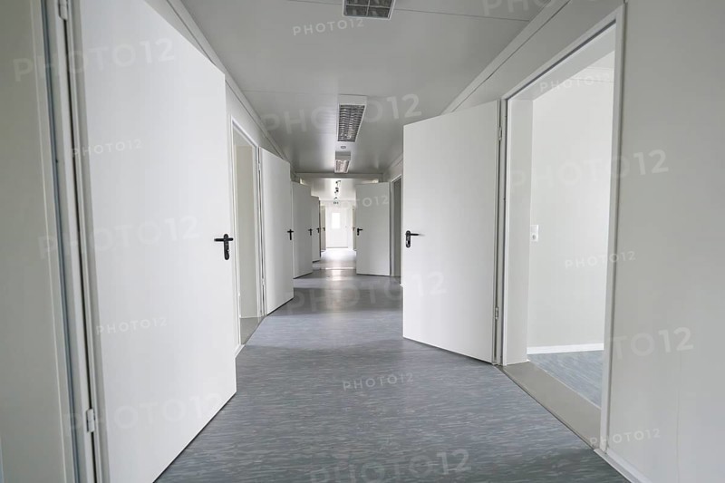 Modern, minimalist hallway with open white doors, Beermiß refugee accommodation, Calmbach, Black Forest, Germany, Europe