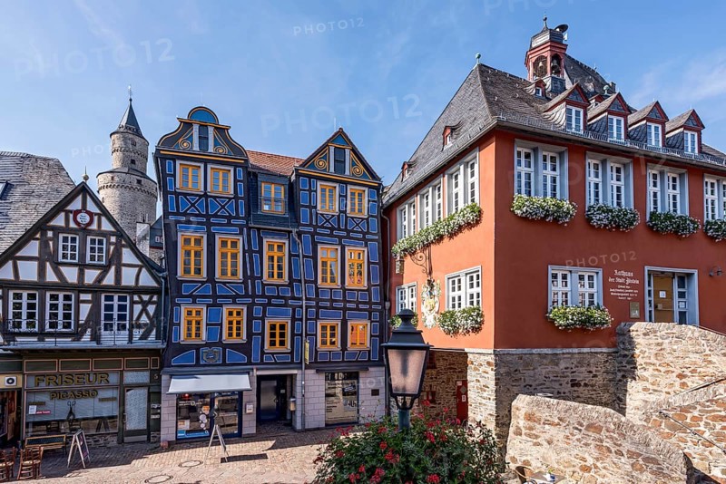 The leaning house, half-timbered house, colourfully painted, witches' tower, town hall, King Adolf Square, historic old town, Idstein, Rheingau Taunus district, German Half-Timbered House Route, Hesse, Germany, Europe