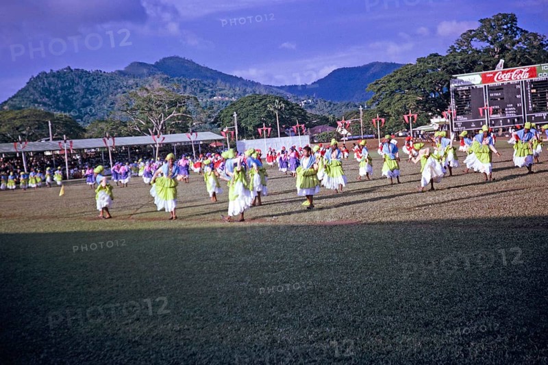 Colourful young female dancers, Port of Spain, Trinidad c 1962 independence pageant