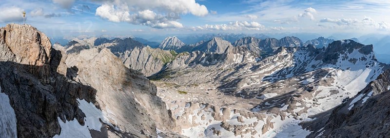 Summit cross on the summit of the Zugspitze, view of mountain panorama with Zugspitzplatt with snow remains and Mieminger chain, Wetterstein Mountains, Bavaria, Germany, Europe