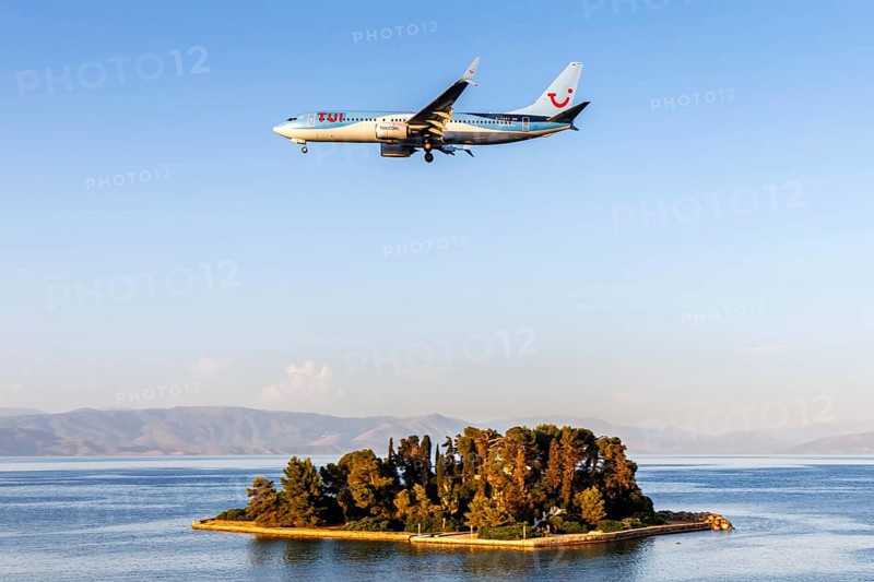 A TUI Boeing 737-800 aircraft with the registration G-TAWX at Corfu Airport, Greece, Europe
