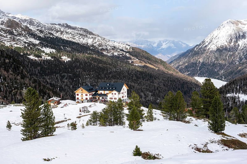 Zufallhütte mountain hut, view of the Martell Valley, snow-covered mountain landscape in winter, Ortler Alps, Vinschgau Valley, Italy, Europe