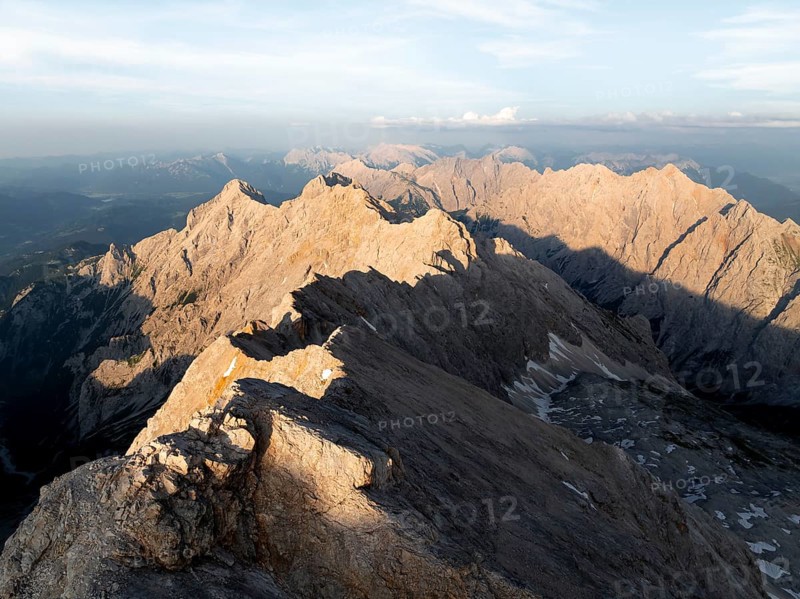 Alpine panorama, aerial view, Zugspitze with Jubiläumsgrat at sunset, high mountains, Bavaria, Germany, Europe