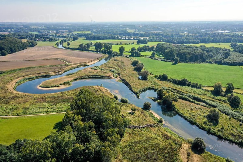 Datteln, North Rhine-Westphalia, Germany - Lippe, river and floodplain development of the Lippe near Haus Vogelsang, where a near-natural river landscape was created, an intact river-floodplain ecosystem restored with flood protection through newly designed floodplains. A new river loop slows down the flow velocity