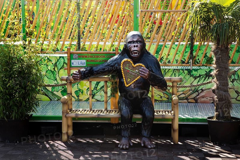 Bench with a great ape to be photographed at the Cranger Kirmes, Herne, Ruhr area, North Rhine-Westphalia, Germany, Europe