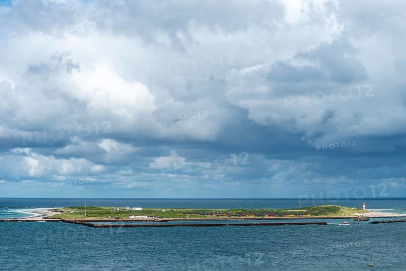 Dune of the offshore island Helgoland, south beach with lighthouse, west pier with dune ferry, cloudy sky, sunshine, North Sea, district Pinneberg, Schleswig-Holstein, Germany, Europe