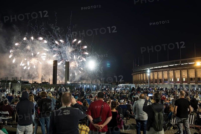 Spectators watch the fireworks at the Pyronale on the Maifeld at the Olympic Stadium, Berlin, 30/08/2024