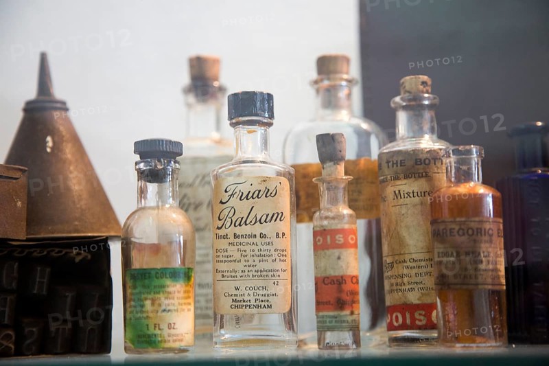 Bottles of chemicals related to Newman's Saddlery industry, with permission of Chippenham museum, Wiltshire, England, UK
