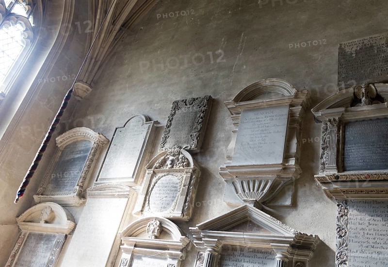 Wall mounted historic grave memorials Interior of church of Saint Bartholomew, Corsham, Wiltshire, England, UK