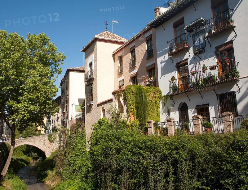 Historic stone bridge crossing the River Rio Darro, Granada, Spain, Europe
