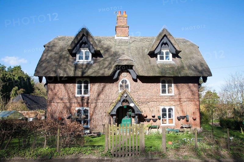 Historic detached thatched rural home called Smoky House, Sudbourne, Suffolk, England, United Kingdom, Europe