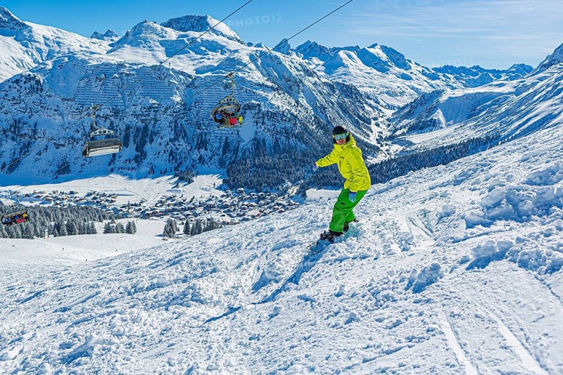 Snowboarders in the Lech Zürs ski resort near Lech, Austria, Europe