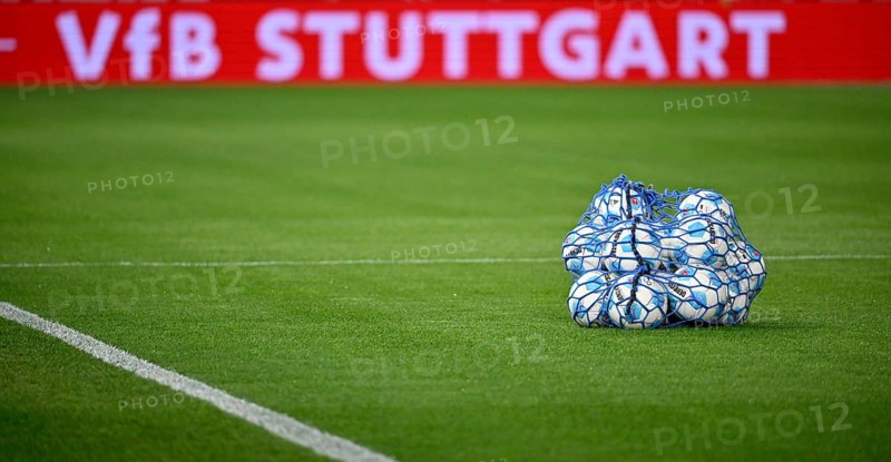 Adidas Derbystar match balls in ball net lying on grass, behind them perimeter advertising VfB Stuttgart, MHPArena, MHP Arena Stuttgart, Baden-Württemberg, Germany, Europe