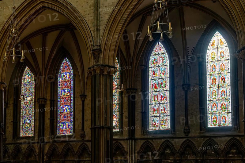 Stained glass windows on nave of cathedral church, Lincoln cathedral, city of Lincoln, Lincolnshire, England, UK