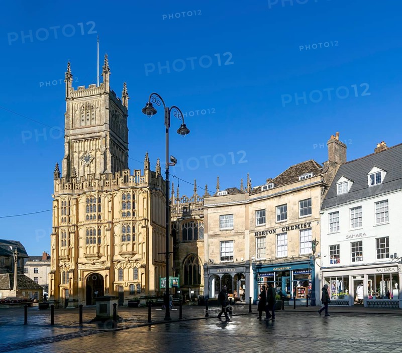 Historic buildings in market place and parish Church of St John Baptist, Cirencester, Gloucestershire, England, UK