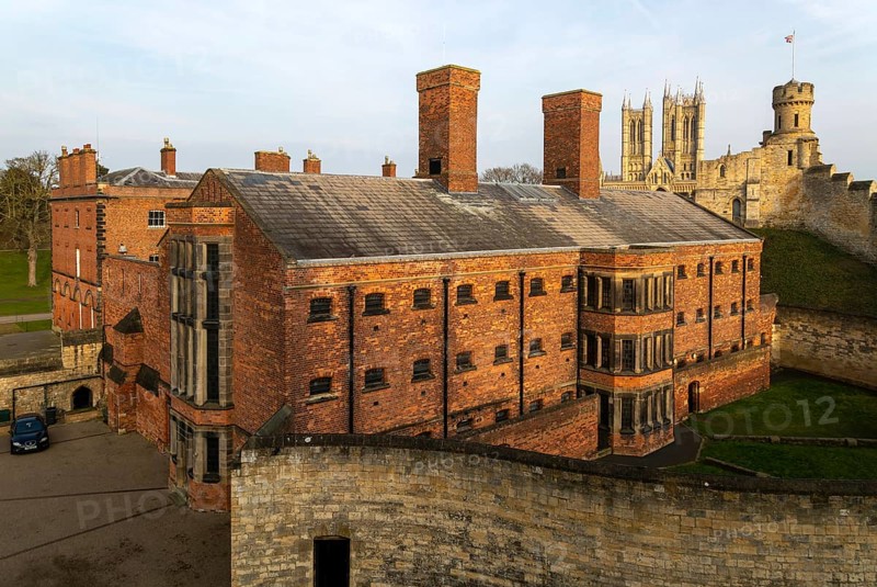 Exterior of Victorian jail museum, Lincoln Castle, city of Lincoln, Lincolnshire, England, UK with cathedral in background