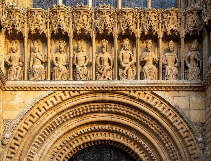 Carved stonework figures of kings, Gallery of Kings, frontage of cathedral church, Lincoln, Lincolnshire, England, UK