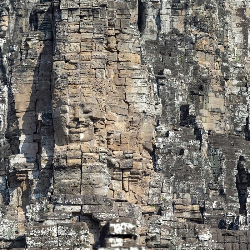 Giant stone-carved face of the Bodhisattva Lokeshvara, also known as Avalokiteshvara, Bayon Temple, Angkor Thom, UNESCO World Heritage Site, Angkor Wat, Siem Reap, Cambodia, Asia