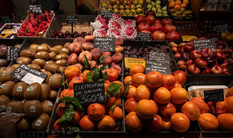 Display, kiwi, clementines, oranges, dates, strawberries, fruit, fruit handler, interior, market hall, Mercat de l'Olivar, Palma de Majorca, Majorca, Balearic Islands, Balearic Islands, Spain, Europe
