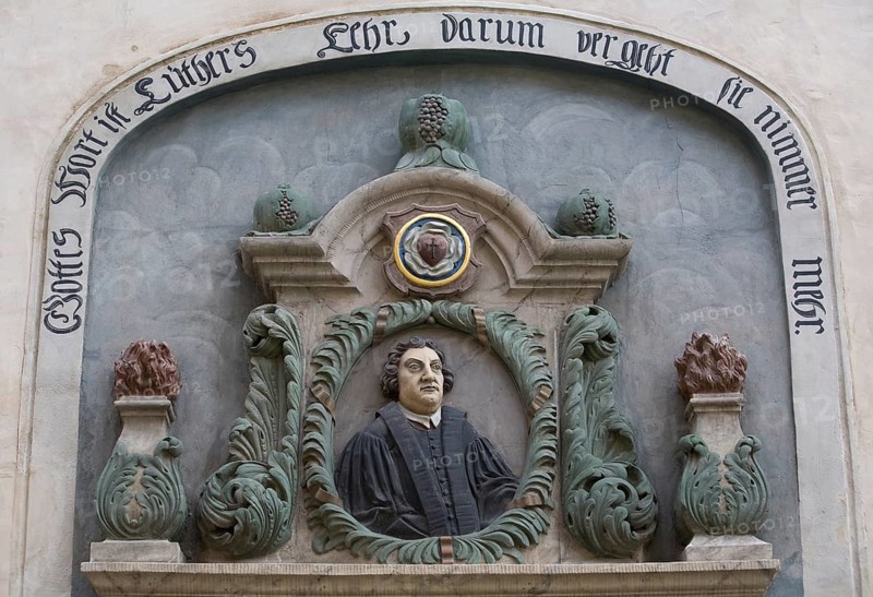 Portrait relief above the street entrance