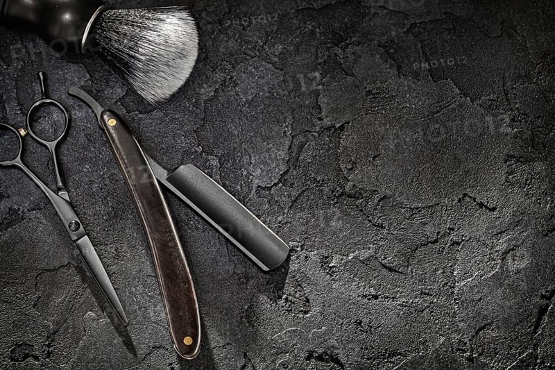 Black Tools Of Barber. Barber Shop. Professional Hair Cutting Scissors Hairdresser Stright Razor Shaving Brush. On Black Background