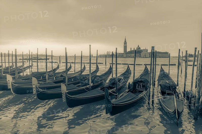 Cloudy atmosphere at sunrise, gondolas, San Giorgio Maggiore church in the background, Venice, Veneto, Italy, Europe