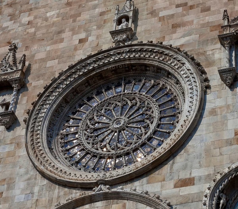 Italy Como Cathedral west façade rose window of the late 15th century, St., Saint, Saint
