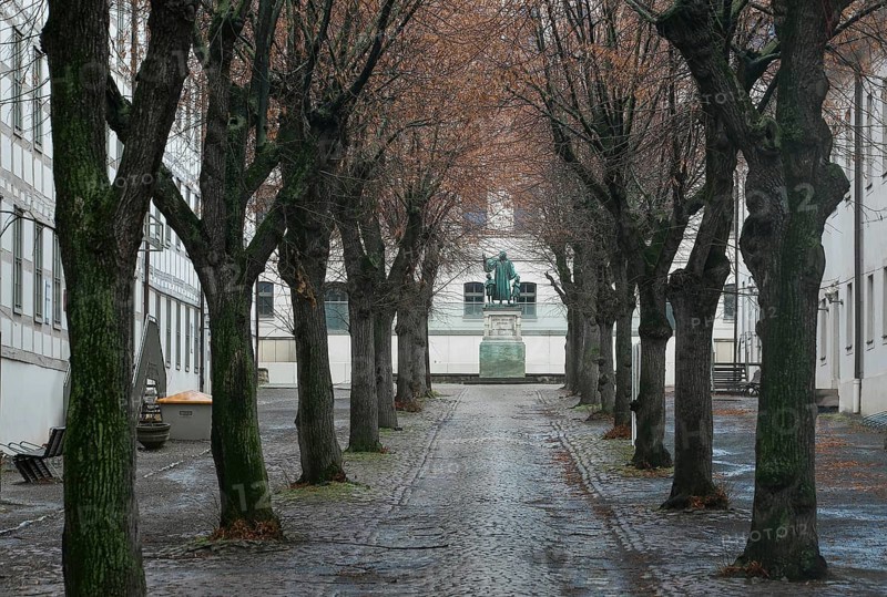 Halle S Francke Foundations 3469 Lindenhof between the foundation buildings (1698-1745) behind Monument to August Hermann Francke by Christian Daniel Rauch 1829