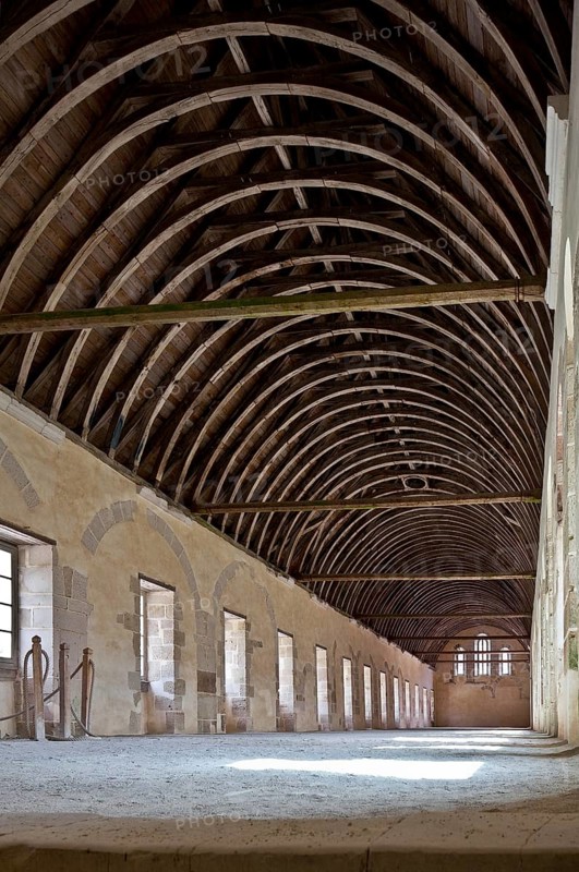 Fontenay former Cistercian monastery dormitory built 12th century interior facing south wooden roof truss 15th century window left later broken in, St., Sankt, Saint