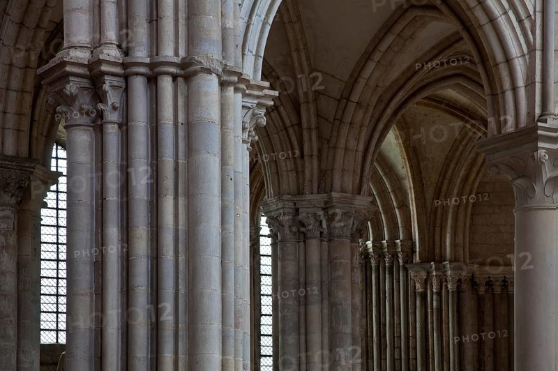 Vezelay, Basilica of Ste-Marie-Madeleine. Interior. Northeastern crossing pillar section at the back of the northern choir aisle, St., Saint, Saint