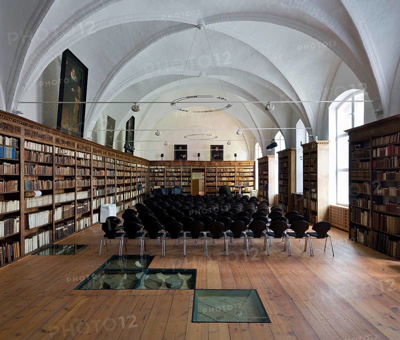 Scharbausaal, dormitory of the Franciscan monks, remodelled in 1618 - 1619 and furnished with ornate oak shelves as a library hall