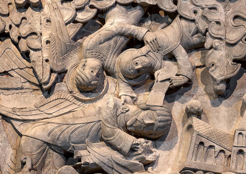 Souillac, former abbey church of Sainte-Marie, portal sculptures, relocated to the interior in the 17th century, Theophilus relief, floating Mother of God withdraws the contract from the sleeping Theophilus and thus saves his salvation