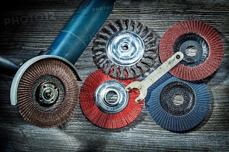 Angle sander and random sanding wheels on vitage wood