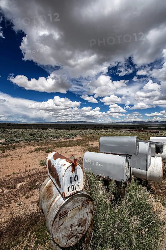 Letterboxes, mailboxes, cumulus clouds Highway 50, Loneliest Road in America, Ely, Nevada, USA, North America