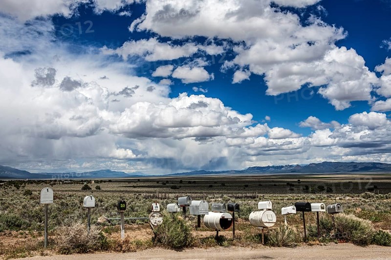 Letterboxes, mailboxes, cumulus clouds Highway 50, Loneliest Road in America, Ely, Nevada, USA, North America