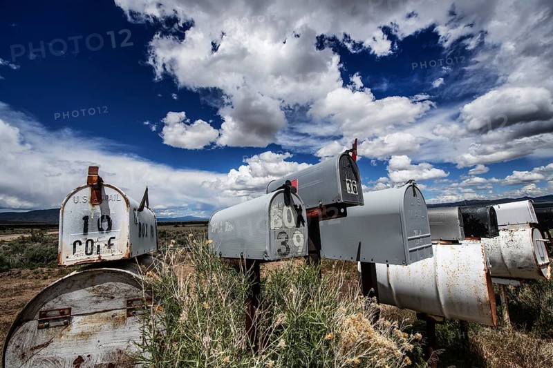 Letterboxes, mailboxes, cumulus clouds Highway 50, Loneliest Road in America, Ely, Nevada, USA, North America