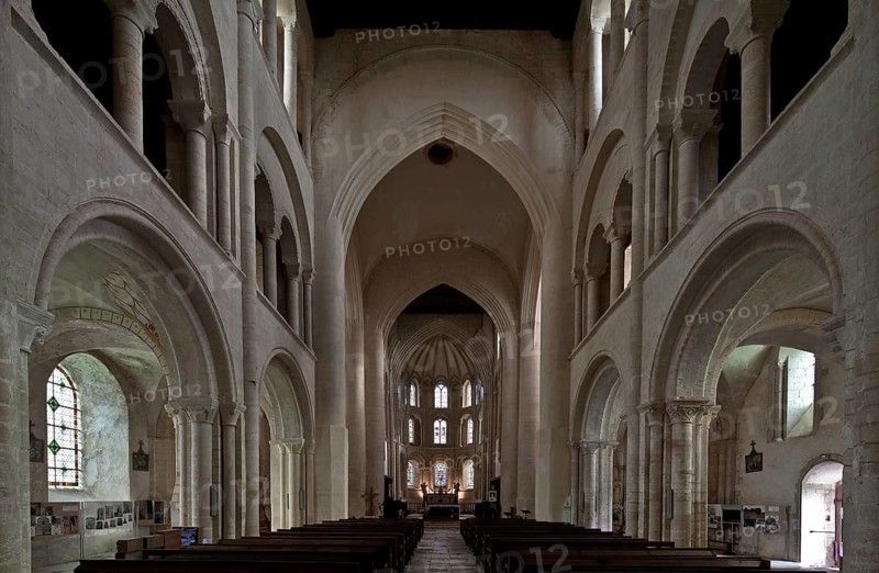 Cerisy-la-Forêt, Normandy, abbey church Interior facing east with a three-zone wall structure, 14th century star vault in the apse and subsequently reinforced crossing pillars