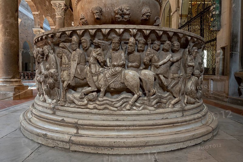 Lucca, San Frediano, north aisle, baptismal font, lower basin with scenes from the story of Moses: Passage through the Red Sea (?)